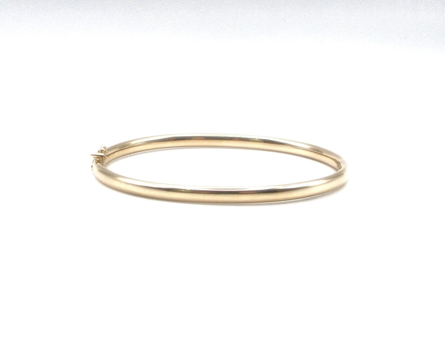 Produktfoto: WEMPE ARMREIF GOLD 750 BREITE 3,9 MM INNENUMFANG 17,0 CM JG 960100370900012